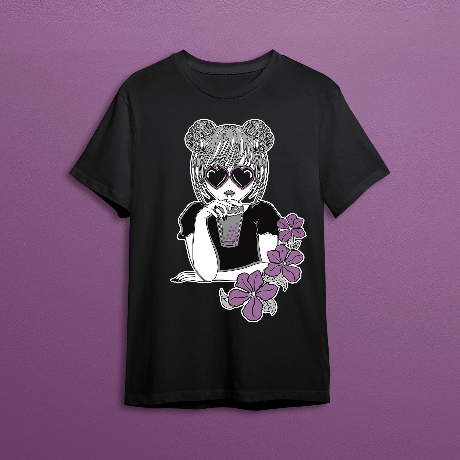 Cute girl drinking boba bubble tea graphic on a black t-shirt.