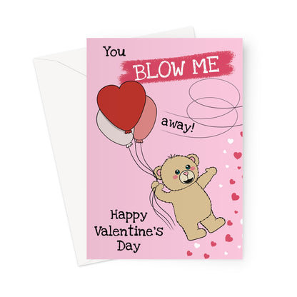 A Valentine's Day card with a cute teddy bear being lifted by red and pink heart-shaped balloons, surrounded by hearts on a pink background. The text reads "You Blow Me Away!" at the top, with "Happy Valentine’s Day" at the bottom.