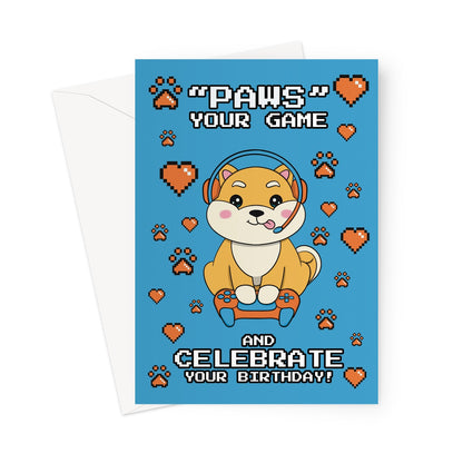 A funny birthday card with an illustration of a shiba inu dog playing video games.