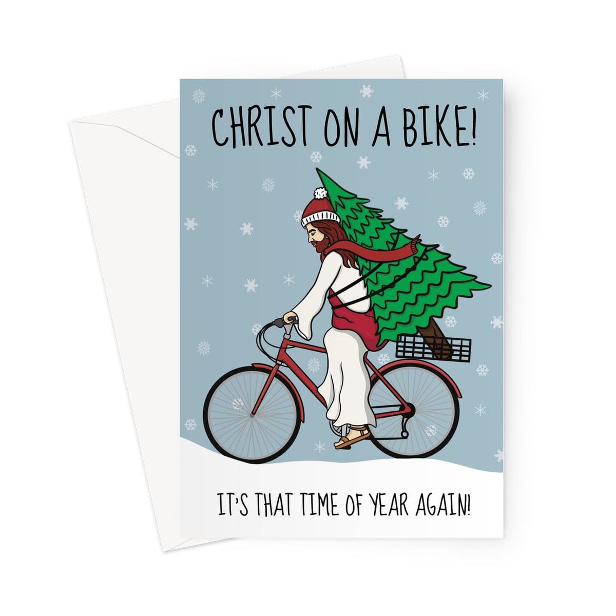 A funny Christmas card with Jesus riding on a bike carrying a Christmas tree on his back.