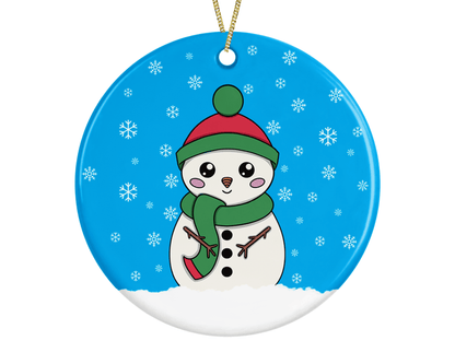 A round ceramic Christmas decoration to hang from a tree. Has a hand drawn illustration of a cute snowman with smiley face and with a blue snowy background.